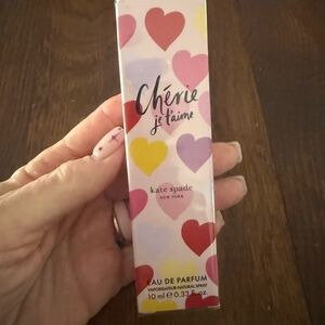 kate spade pink heart-print perfume set with gold accent